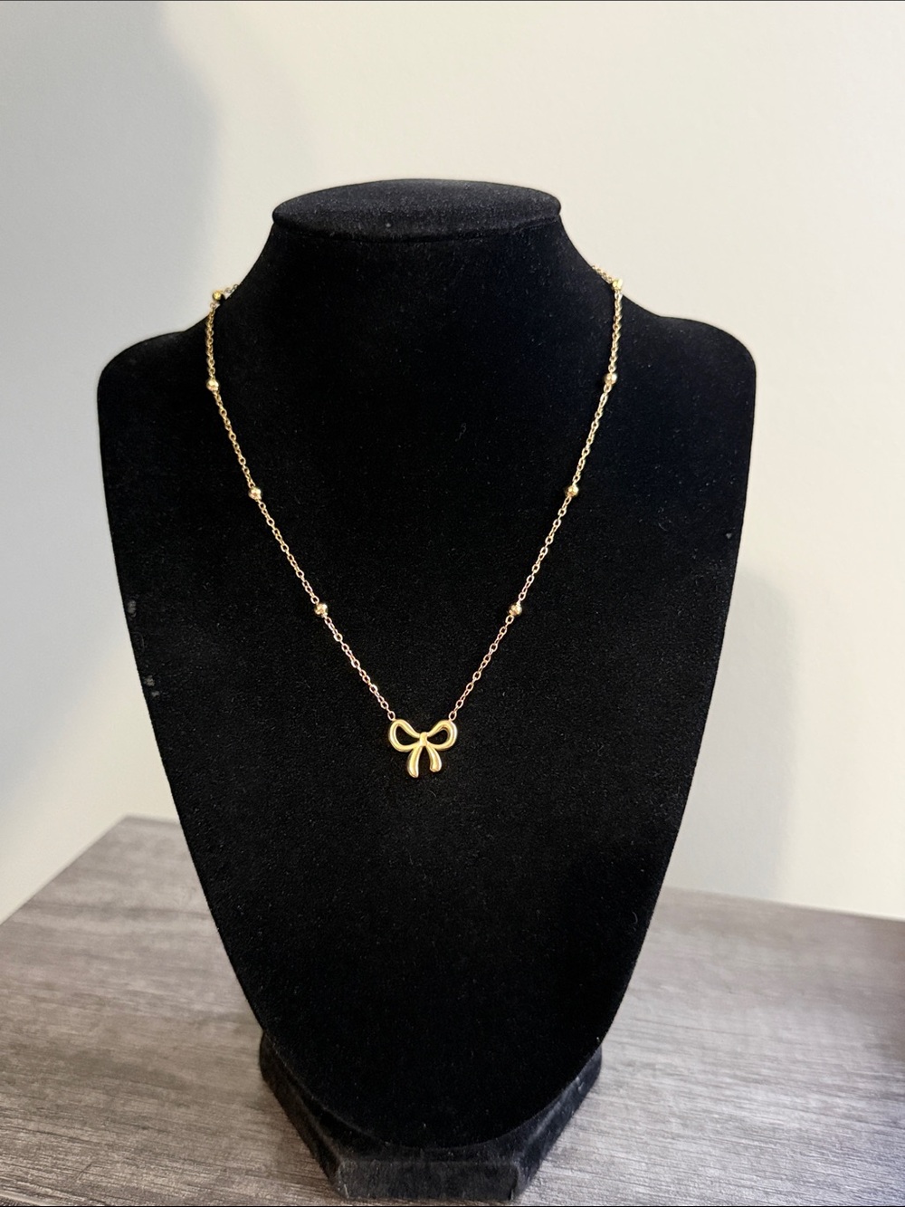 Gold plated stainless steel Bow necklace